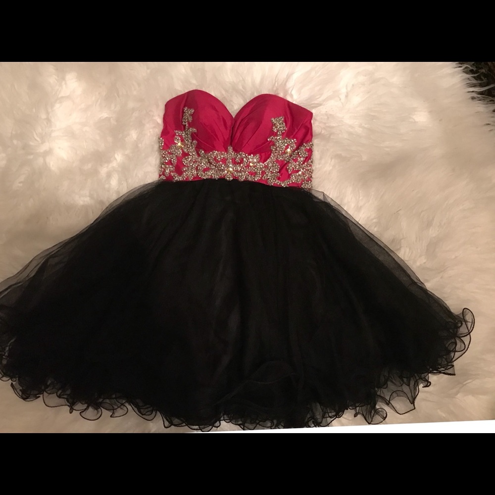 Beautiful glam dress. Glitz and frill size 8